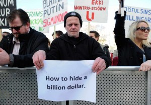  People demonstrate against Iceland‘s Prime Minister Sigmundur Gunnlaugsson in Reykjavik, Iceland on April 4, 2016 after the Panama Papers revealed his wife owns a tax haven–based company with large claims on the country‘s collapsed banks. (Reuters / Stigtryggur Johannsson)