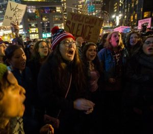 Demonstrators at Columbus Circle in New York on Wednesday after Donald J. Trump was elected president. Credit Hiroko Masuike/The New York Times